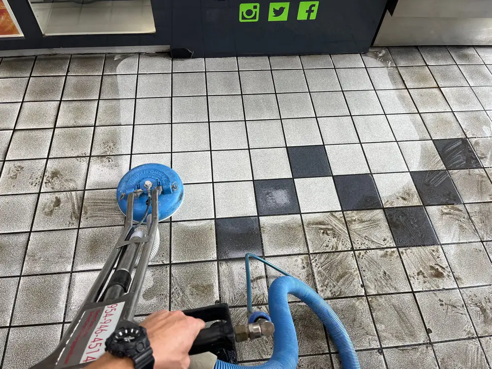 Professional black and white tile cleaning at a bagel shop in Boca Raton, FL