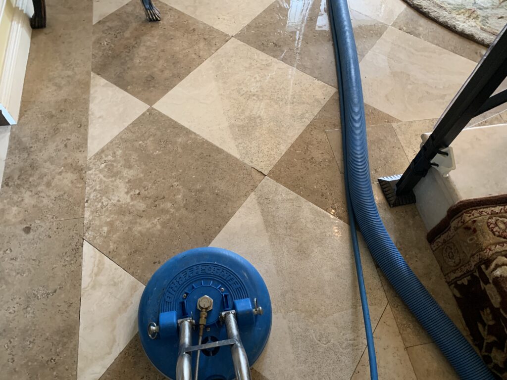 Grey and beige tile floor cleaning in a Fort Lauderdale home showing refreshed grout lines and restored color